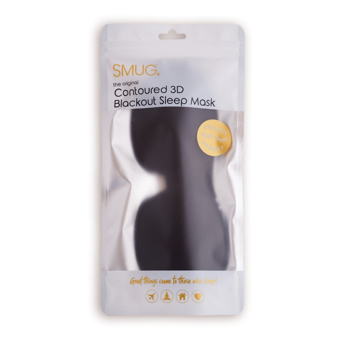 Black SMUG contoured sleep mask in its retail packaging.